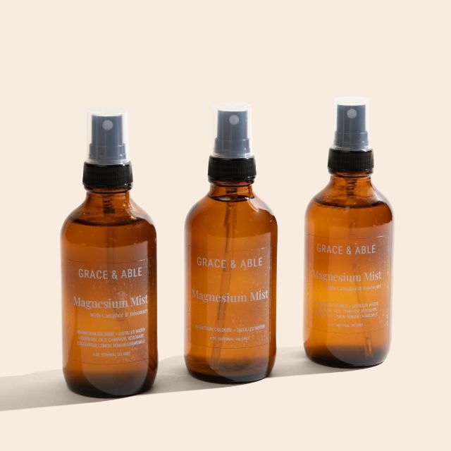 3 Line up bottle of Magnesium Mist. These aromatic mists offer a refreshing experience with added anti-inflammatory benefits.