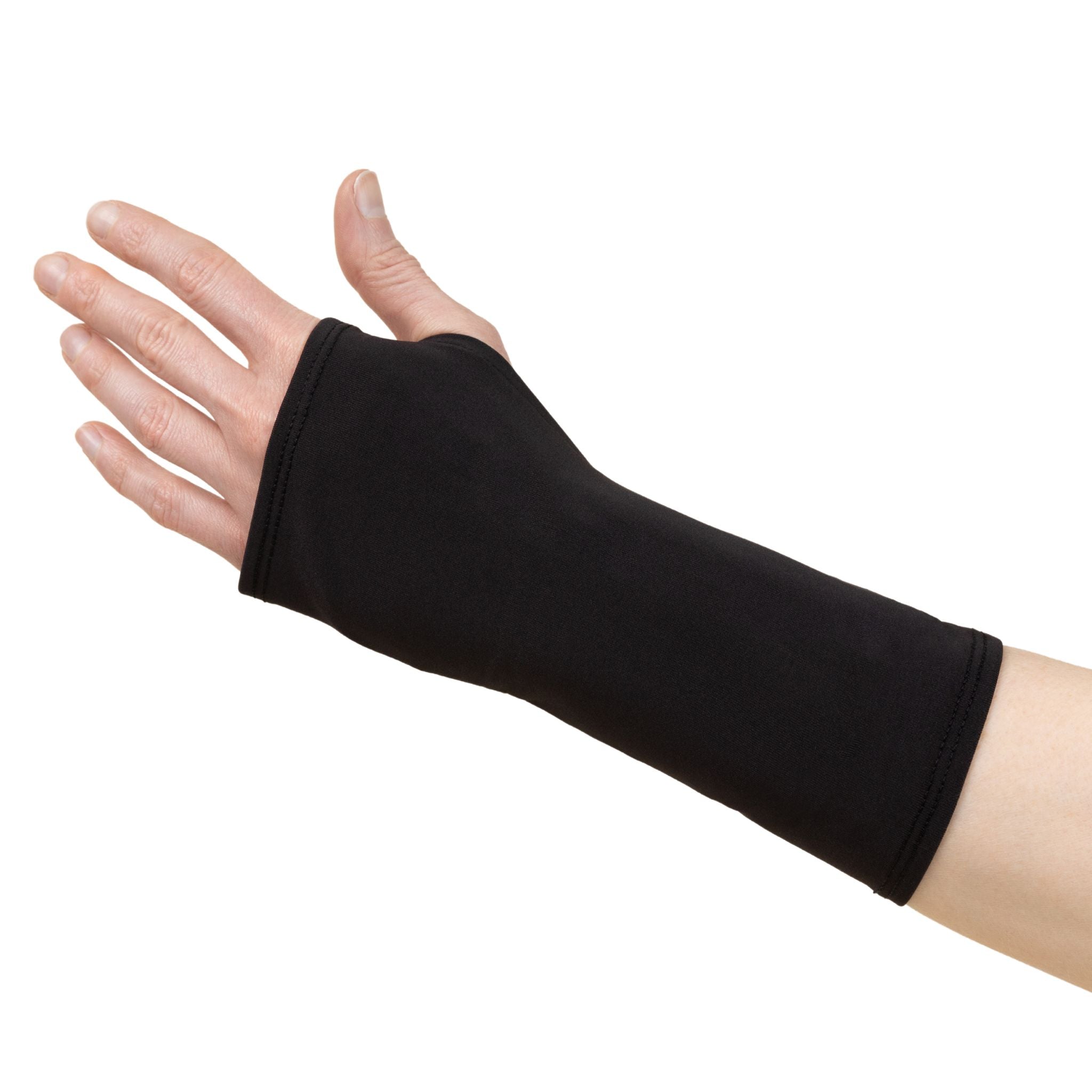 An Inky Black wrist brace cover, worn on the hand, with an opening for the thumb and fingers exposed.