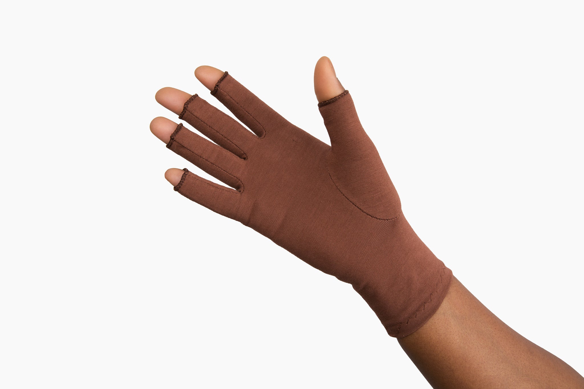 Cocoa Brown Compression Gloves on a woman's hand showing the palm of her hand