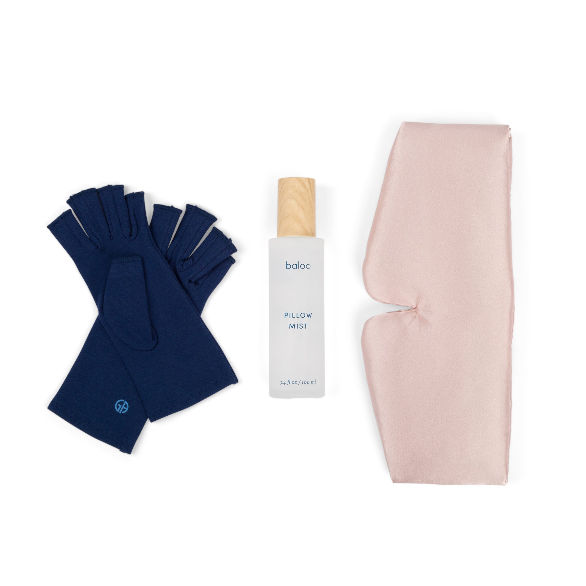 Marine Blue Compression Gloves, Baloo Living Pillow Mist, and Silky Soft Eye Mask Flatlay