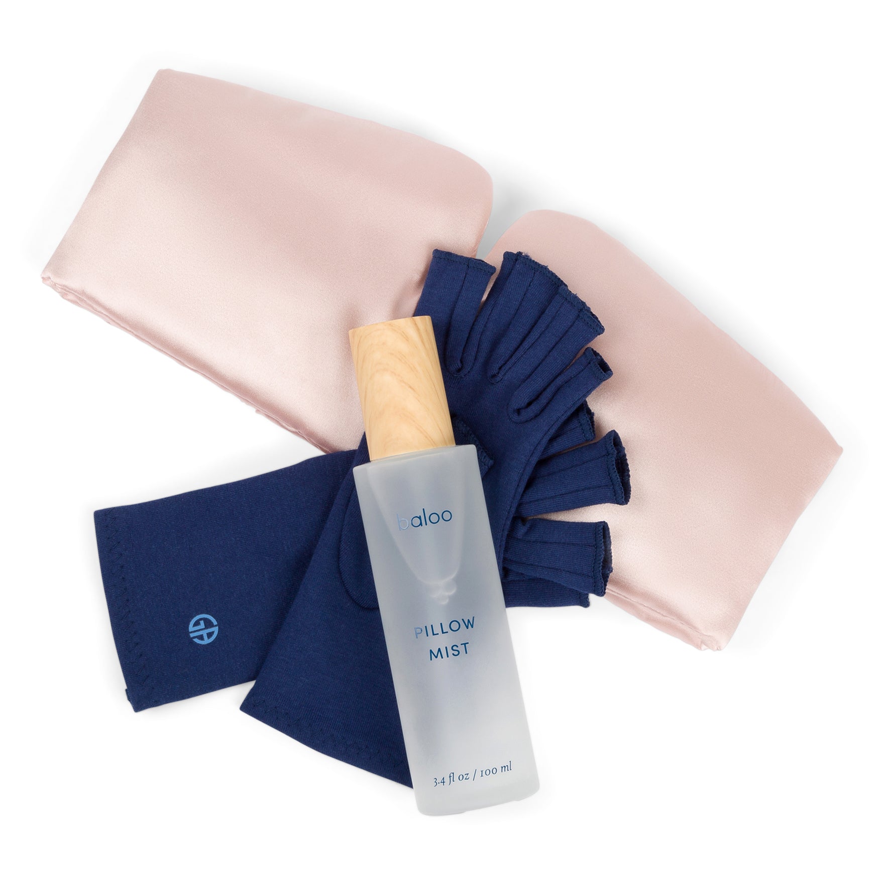 Marine Blue Compression Gloves, Baloo Living Pillow Mist, and Silky Soft Eye Mask Flatlay